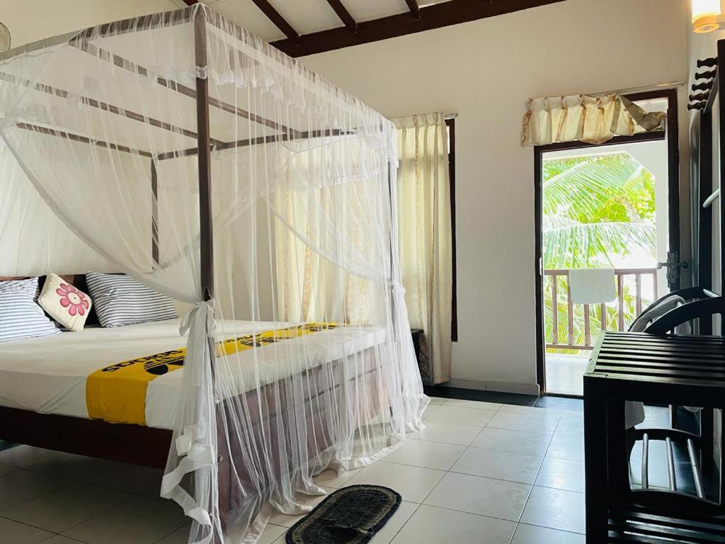 Rainbow Surf Beach Hotel Koggala Quarto foto
